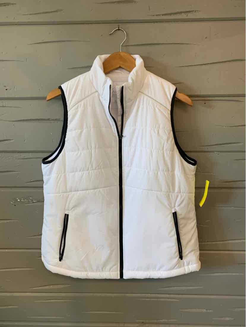 White quilted sleeveless vest with black zipper and trim, standing collar, and two front zip pockets.