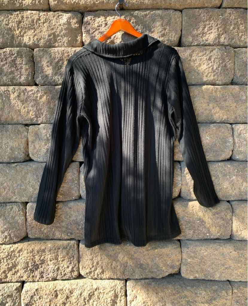 Black ribbed long-sleeve fleece pullover with high collar and relaxed fit.