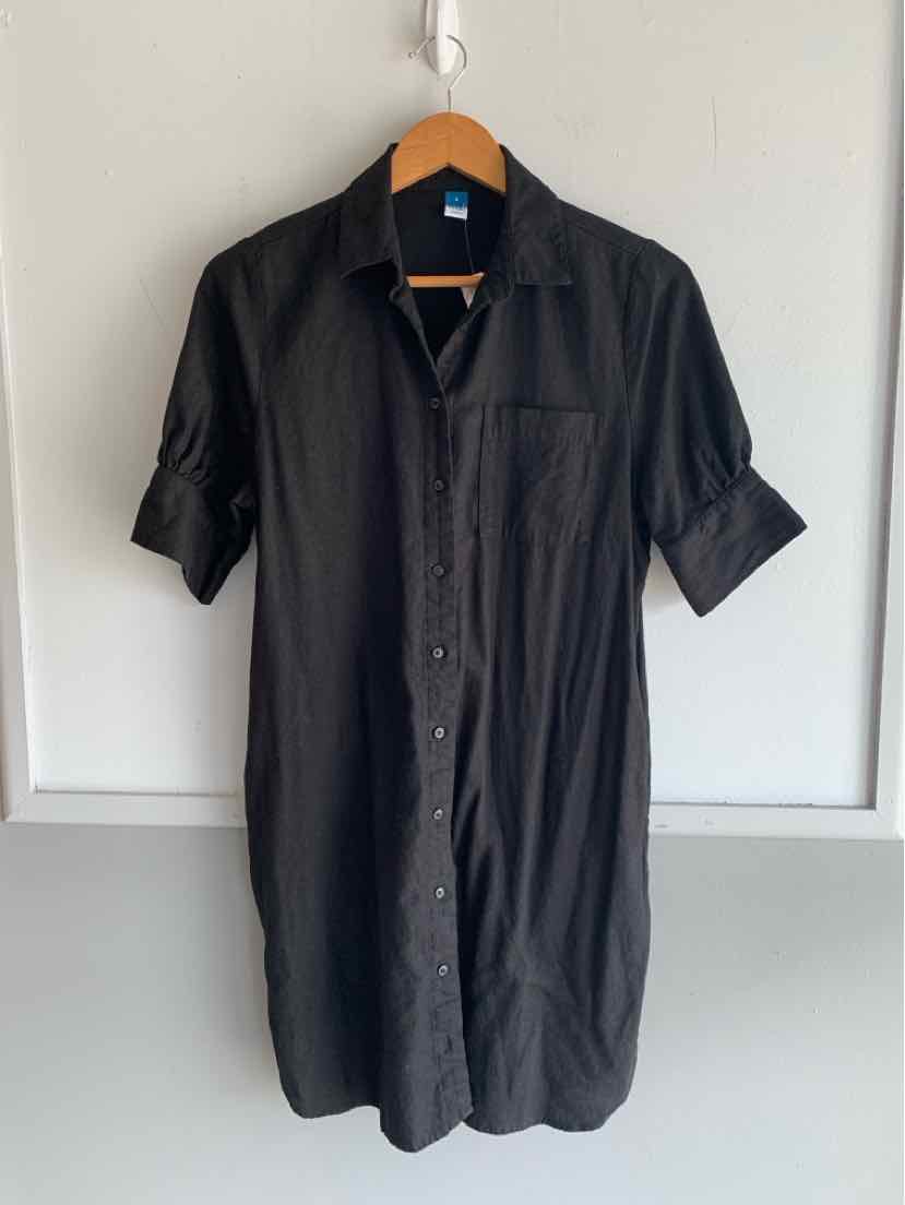 Black short-sleeve button-down shirt dress with collar and chest pocket.