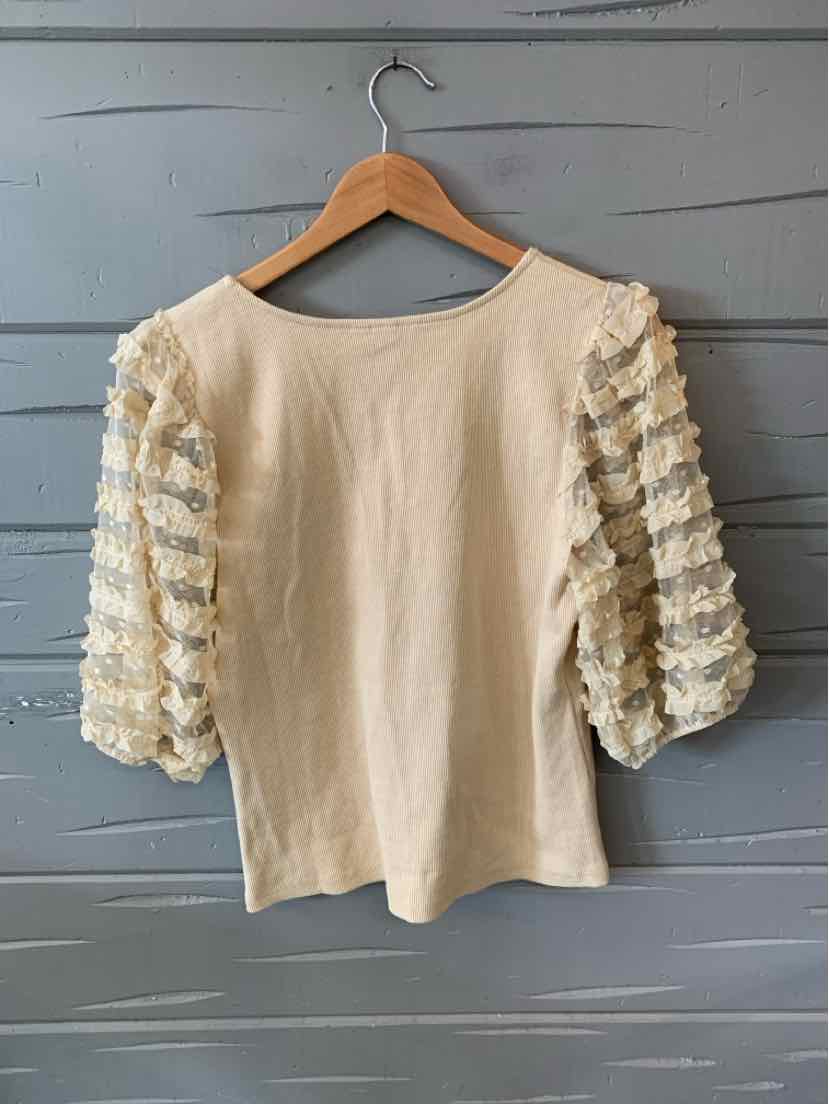 Tan knit top with textured lace puff sleeves and a wide round neckline, size XL.