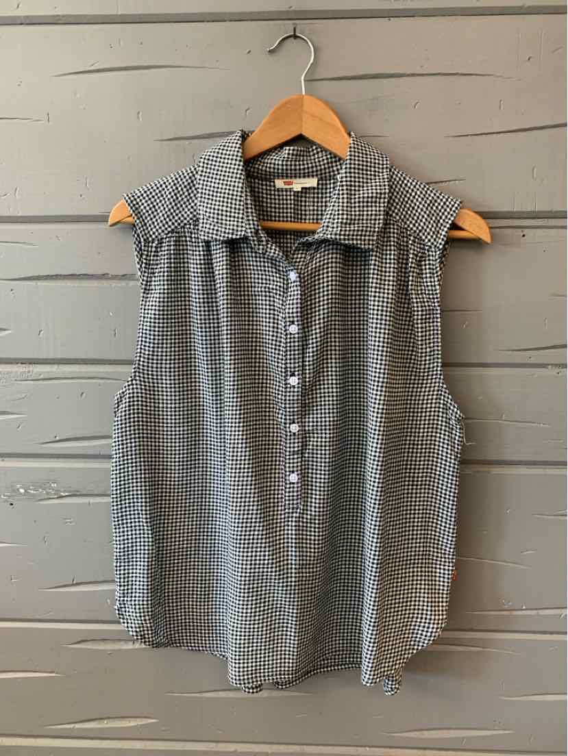 Sleeveless black and white gingham button-up shirt with collar, size large, hanging on wooden hanger.