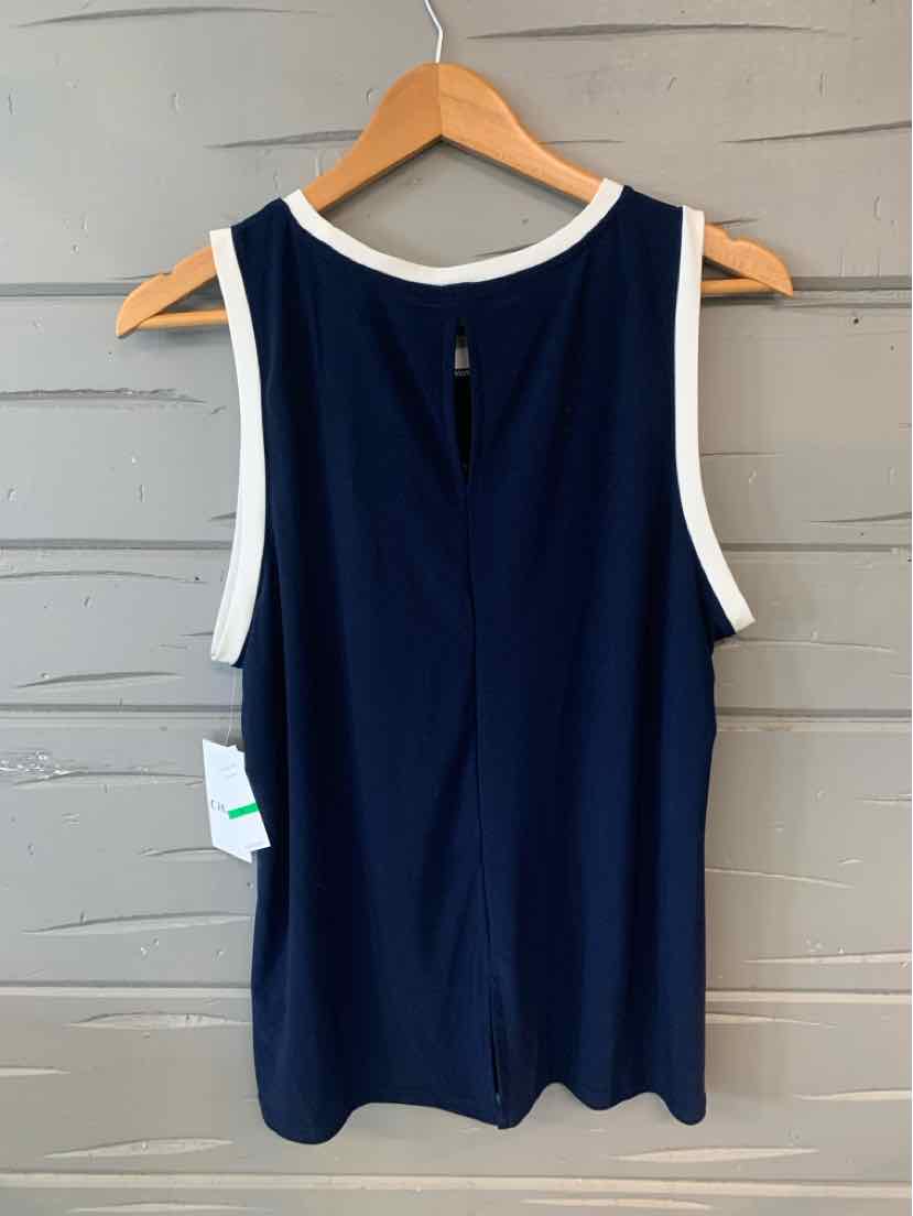 Navy blue sleeveless top with white trim on collar and armholes, hanging on wooden hanger.