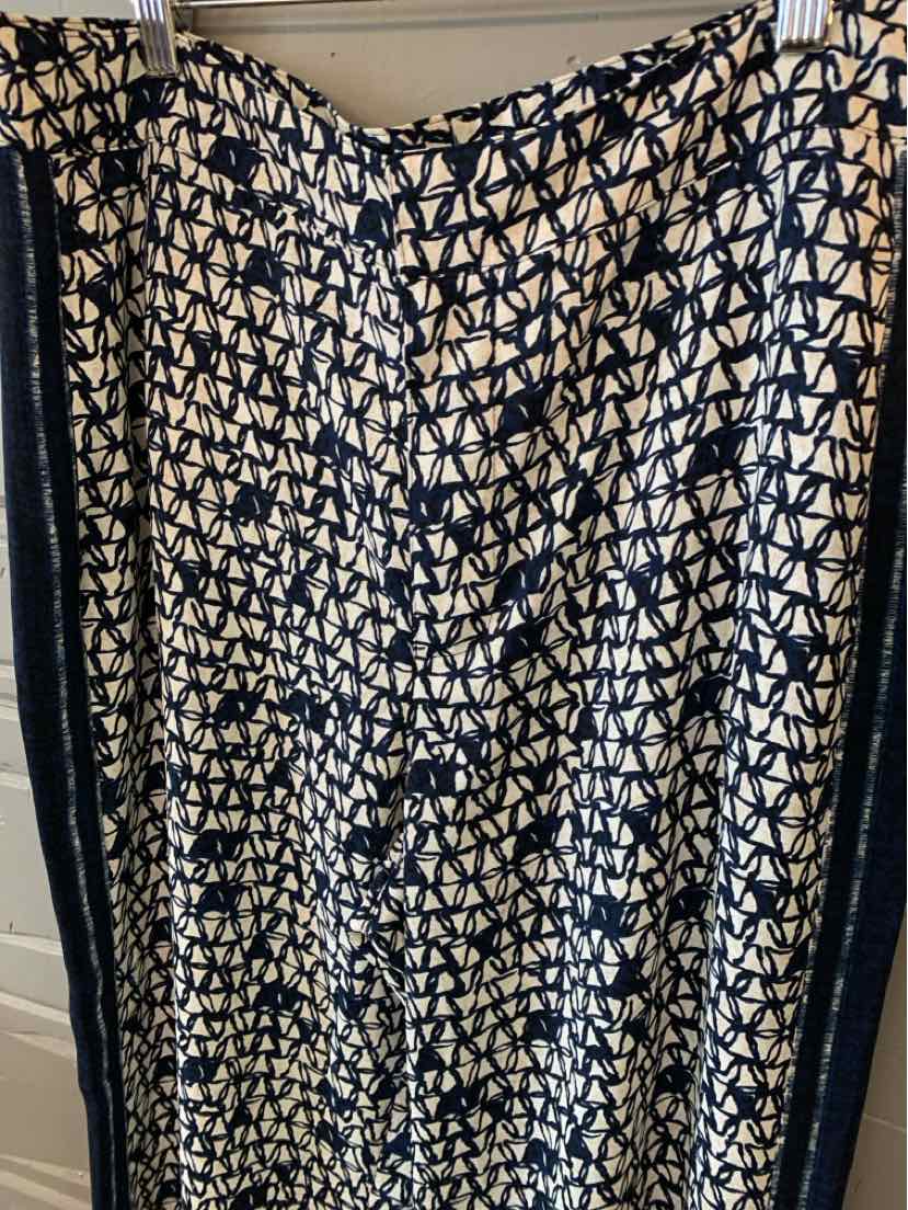 Womens skirt with black and white abstract geometric pattern, side seam detailing, and a slightly flared shape.