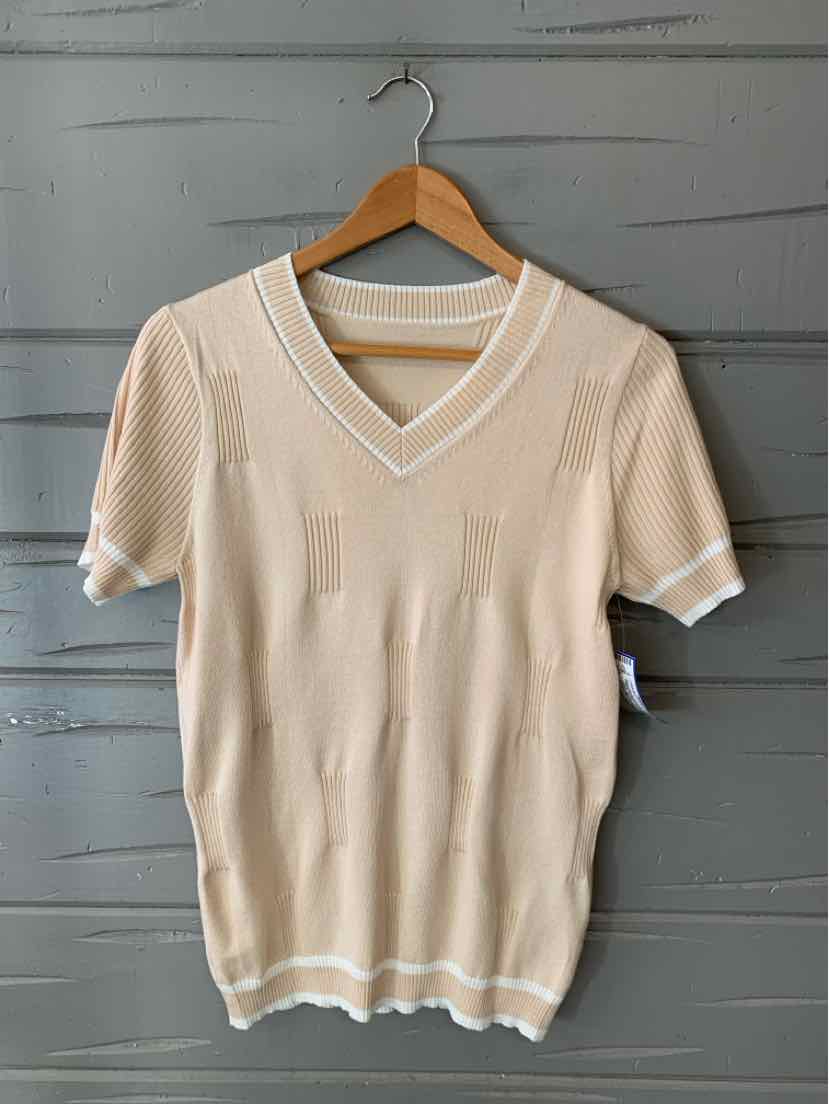 Beige short-sleeve knit sweater with V-neck and white trim on collar, sleeves, and hem.