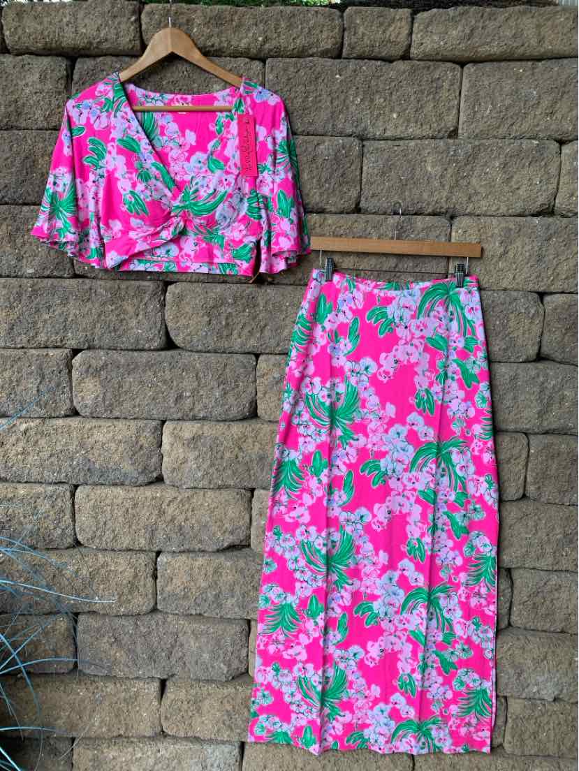 Pink and green floral cropped blouse with matching high-waisted maxi skirt set.