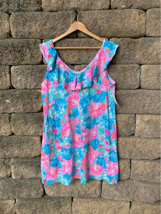 Aqua sleeveless dress with pink and blue floral pattern and ruffle detail at neckline, size XL.