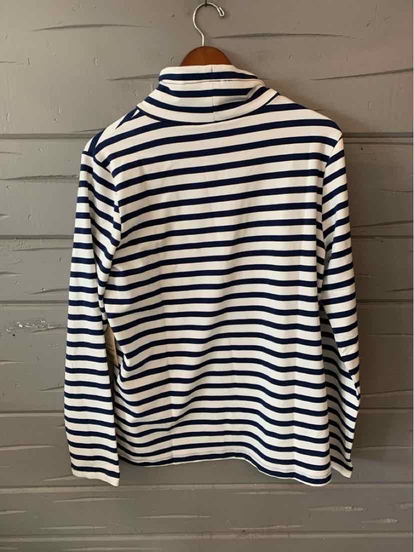 White long-sleeve shirt with navy horizontal stripes and a crew neckline hanging on wooden hanger.