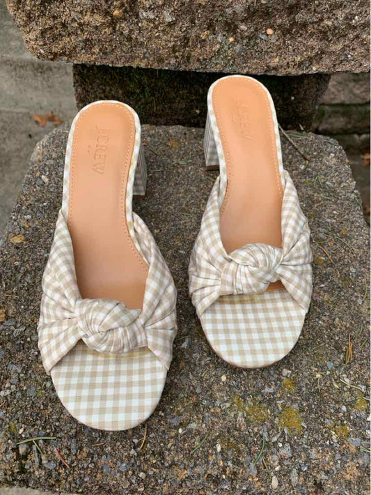Tan gingham slip-on shoes with knotted bow detail and square open toes, size 6.