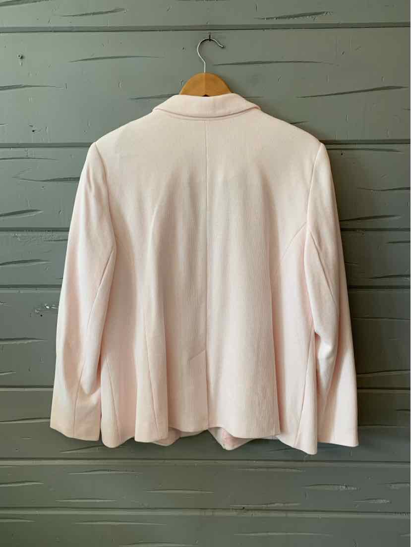 Light pink women's blazer with long sleeves and a classic collar, back view.